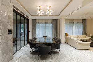 Dinning space accompanied with living area designed for house in jaipur